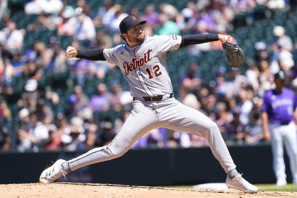 May 8, 2025; Denver, Colorado, USA; Detroit Tigers starting pitcher Casey Mize (12) delivers a pitch in the fourth inning against the Colorado Rockies at Coors Field. Mandatory Credit: Ron Chenoy-Imagn Images