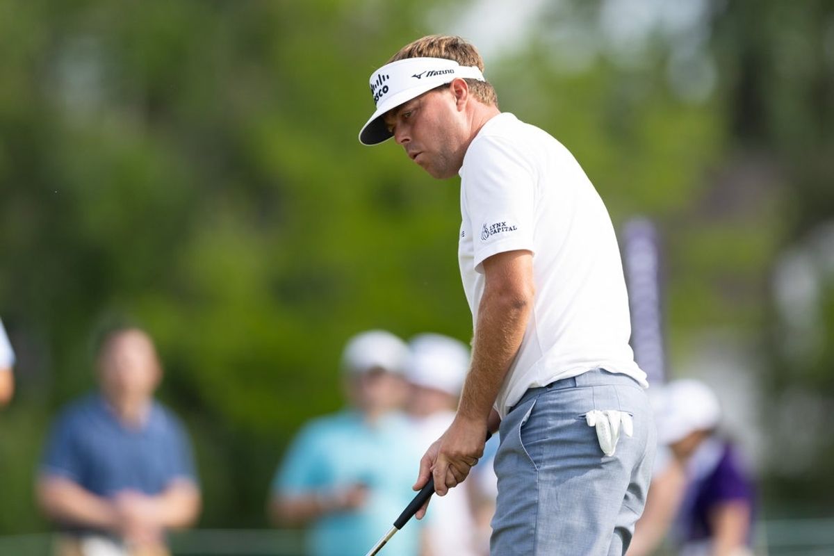May 8, 2025; Philadelphia, Pennsylvania, USA; Keith Mitchell reacts after missing a putt on the ninth hole during the first round of the Truist Championship golf tournament. Mandatory Credit: Bill Streicher-Imagn Images
