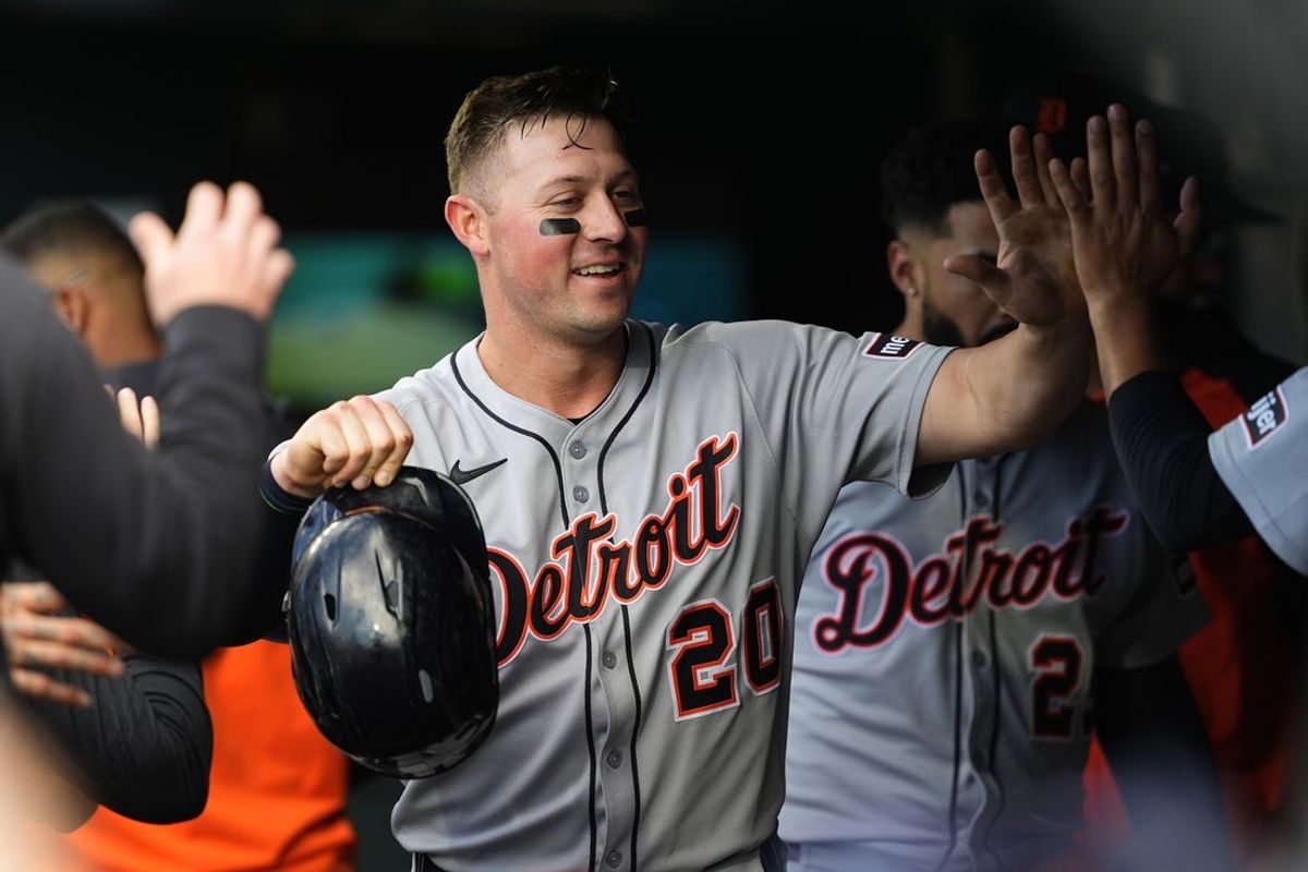 May 8, 2025; Denver, Colorado, USA; Detroit Tigers first base Spencer Torkelson (20) celebrates scoring a run in the third inning against the Colorado Rockies at Coors Field. Mandatory Credit: Ron Chenoy-Imagn Images