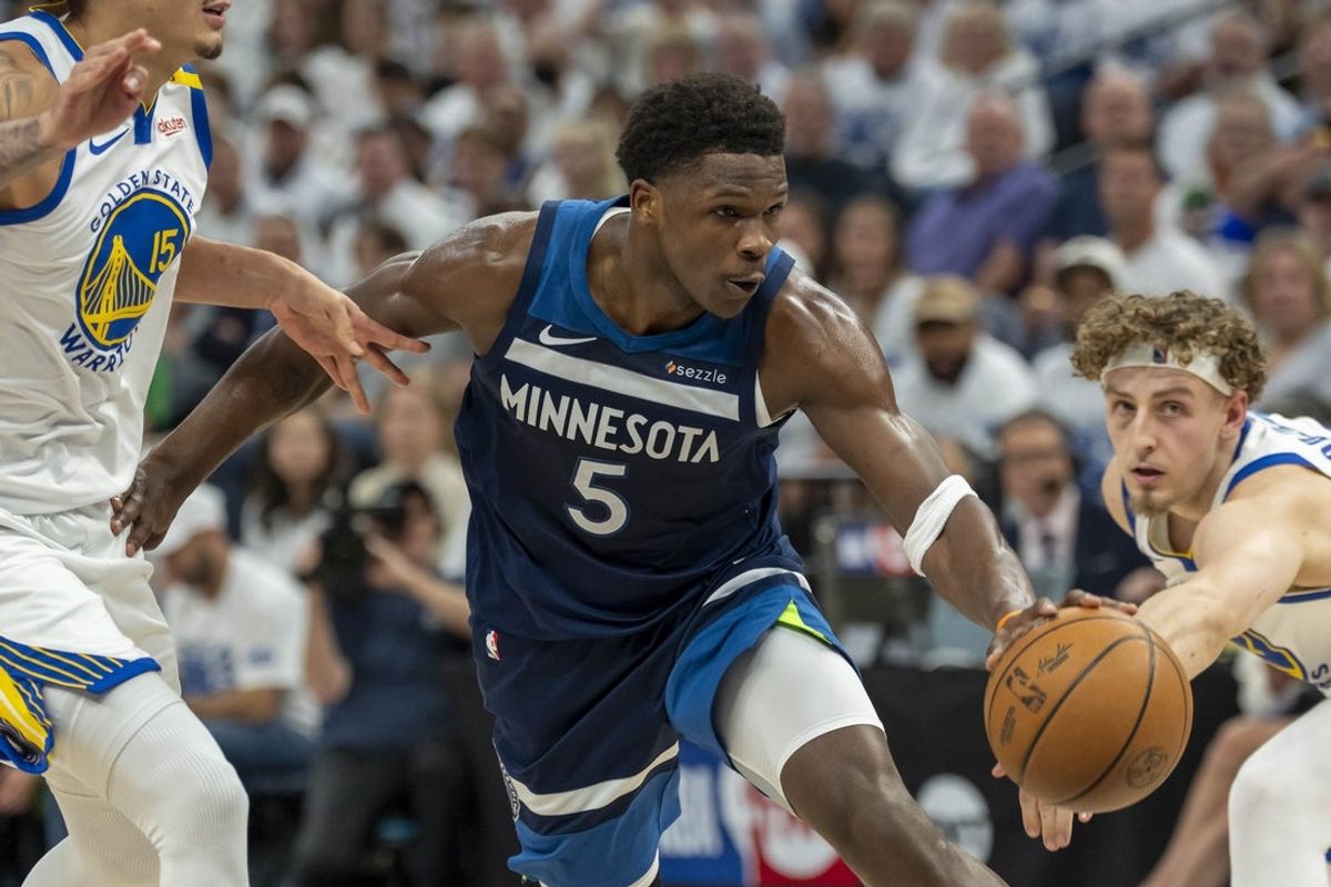 May 8, 2025; Minneapolis, Minnesota, USA; Minnesota Timberwolves guard Anthony Edwards (5) drives to the basket against the Golden State Warriors in the first half during game two of the second round for the 2025 NBA Playoffs at Target Center. Mandatory Credit: Jesse Johnson-Imagn Images