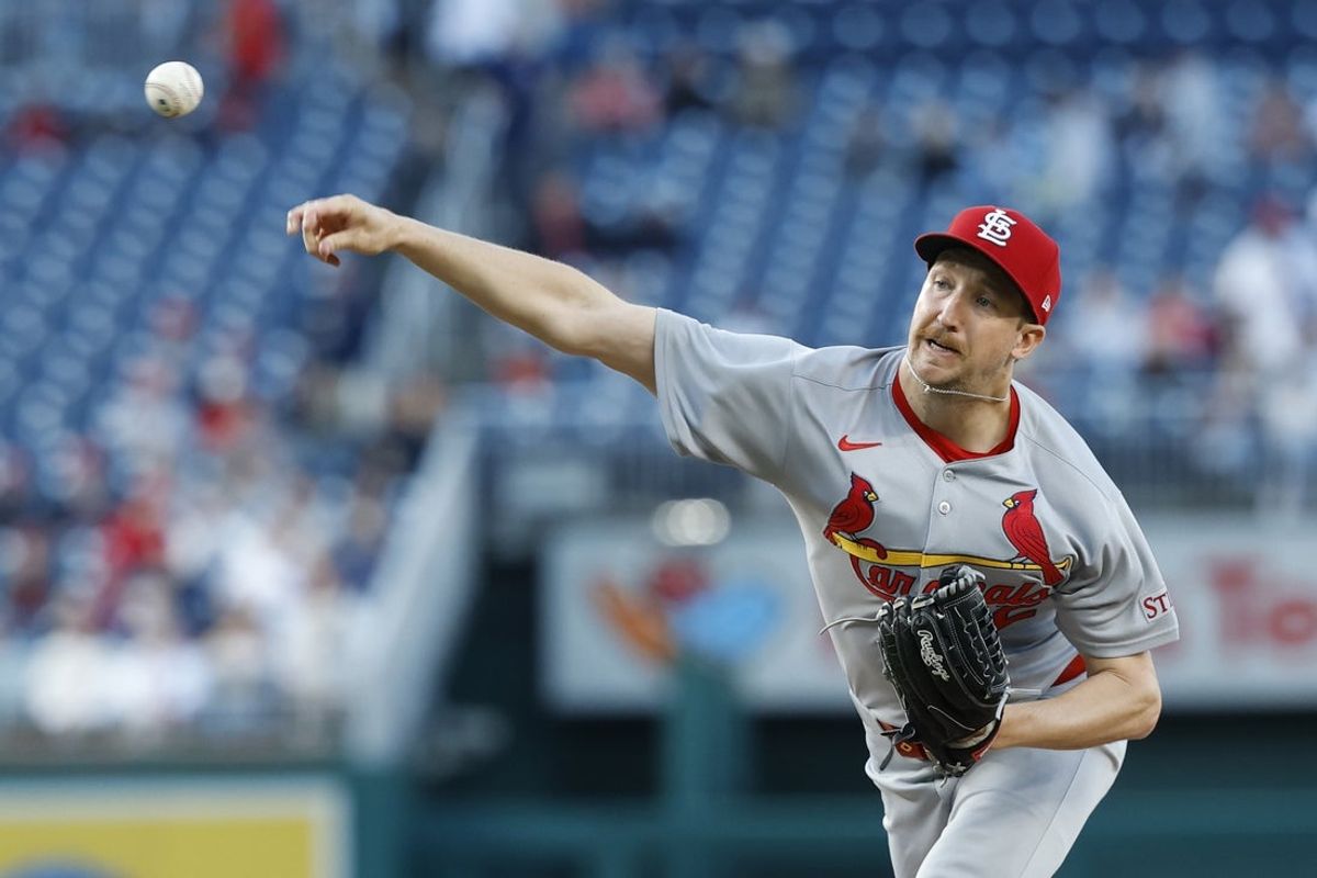 May 9, 2025; Washington, District of Columbia, USA; St. Louis Cardinals starting pitcher Erick Fedde (12) pitches against the Washington Nationals during the second inning at Nationals Park. Mandatory Credit: Geoff Burke-Imagn Images