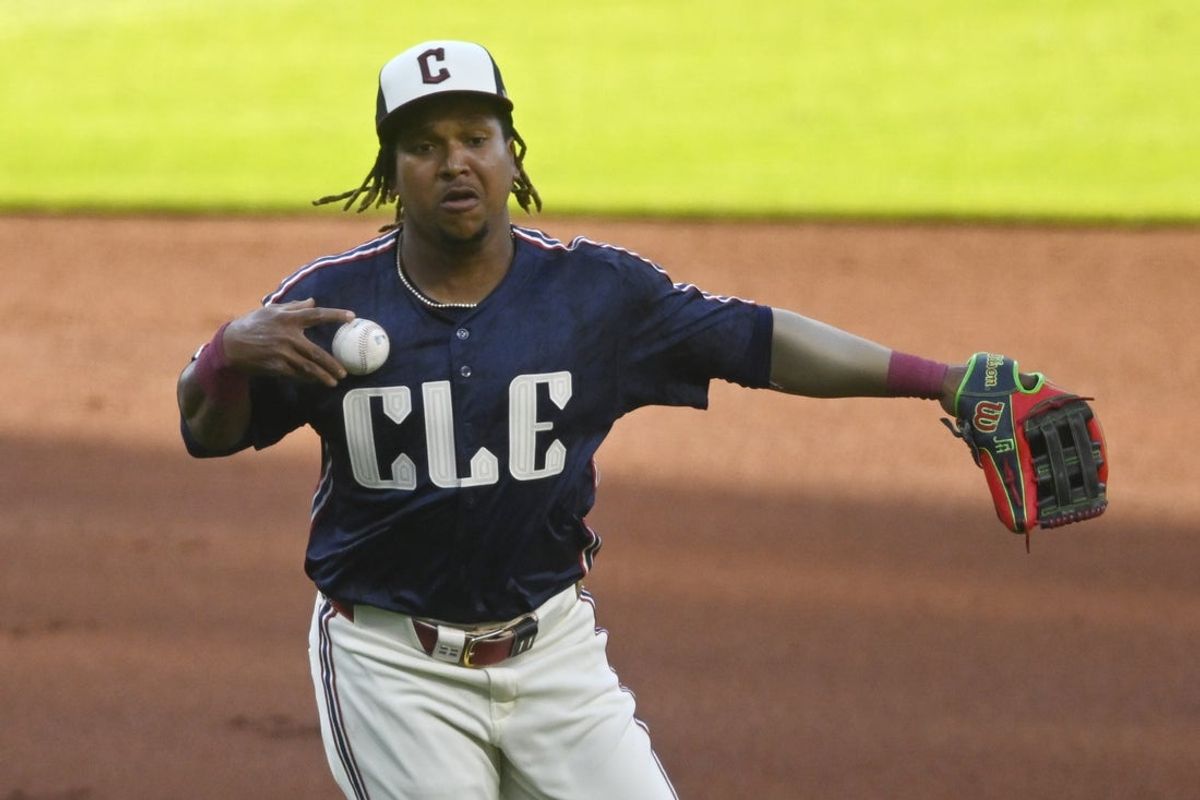 May 9, 2025; Cleveland, Ohio, USA; Cleveland Guardians third baseman Jose Ramirez (11) bobbles the ball on an infield hit in the first inning against the Philadelphia Phillies at Progressive Field. Mandatory Credit: David Richard-Imagn Images