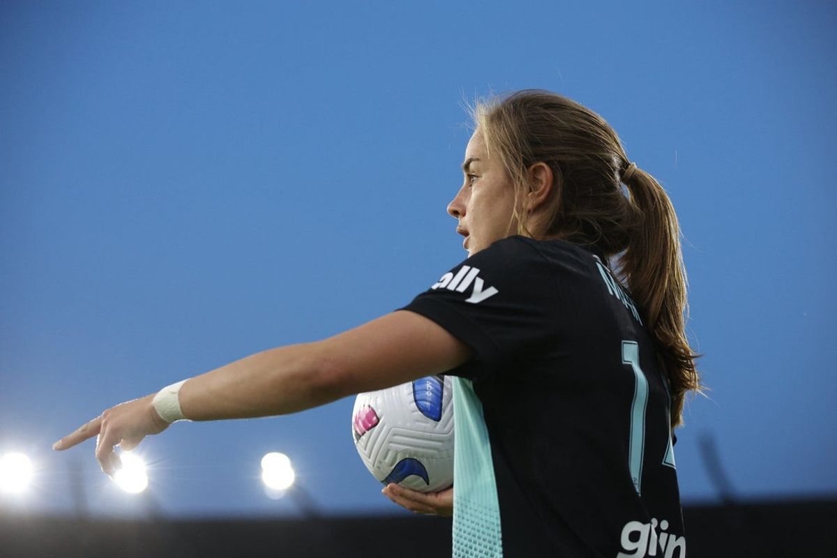 May 9, 2025; Louisville, Kentucky, USA; Gotham FC midfielder Nealy Martin (14) throws in the ball during the second half against Racing Louisville FC at Lynn Family Stadium. Mandatory Credit: EM Dash-Imagn Images