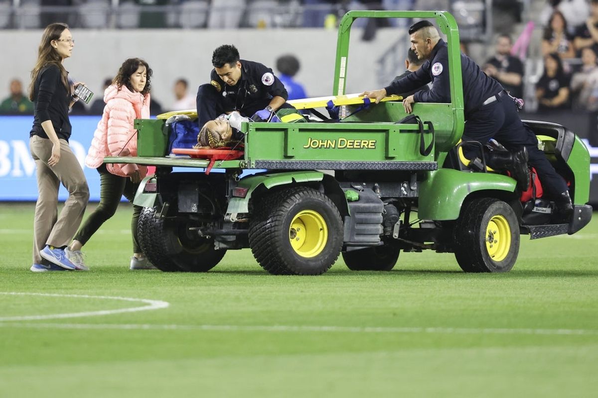 May 9, 2025; Los Angeles, California, USA; Medical staff attend to Angel City FC defender Savy King (3) as she exits the game on a cart during the second half of a soccer game against the Utah Royals at BMO Stadium. Mandatory Credit: Jessica Alcheh-Imagn Images