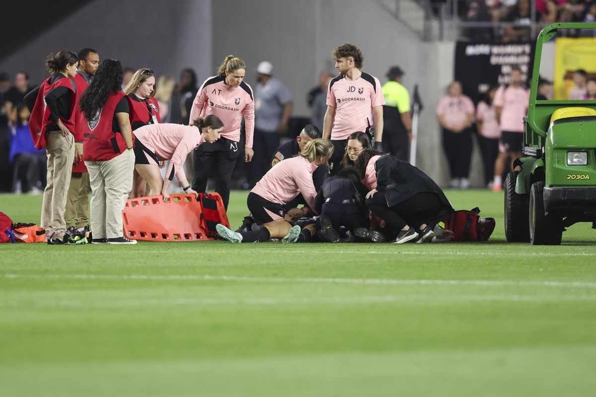 May 9, 2025; Los Angeles, California, USA; Medical staff attend to Angel City FC defender Savy King (3) during the second half of a soccer game against the Utah Royals at BMO Stadium. Mandatory Credit: Jessica Alcheh-Imagn Images