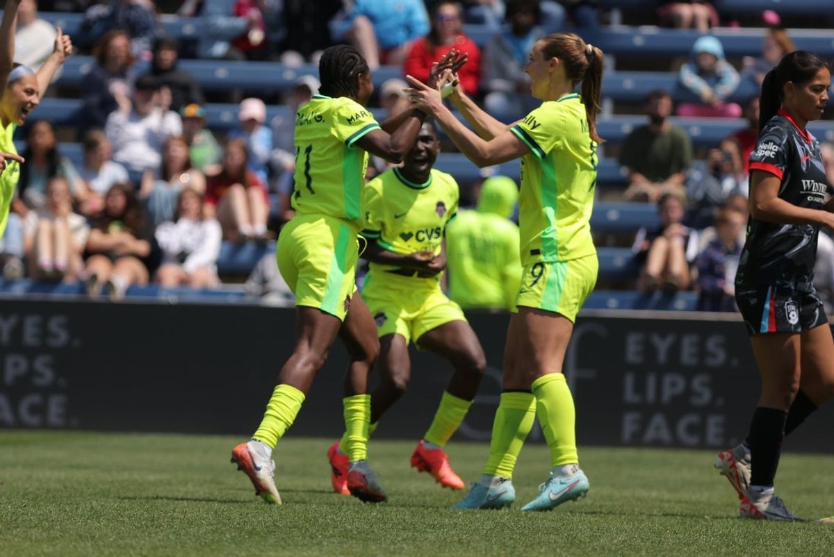 May 10, 2025; Bridgeview, Illinois, USA; Washington Spirit forward Gift Monday (21) celebrates with Washington Spirit defender Tara McKeown (9) after scoring during the second half against Chicago Stars FC at SeatGeek Stadium. Mandatory Credit: Melissa Tamez-Imagn Images