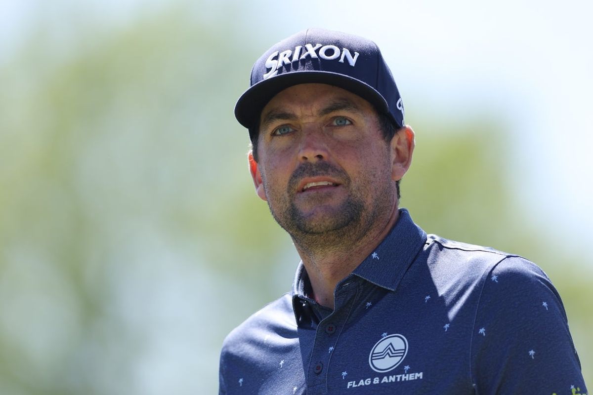 May 10, 2025; Philadelphia, Pennsylvania, USA; Keegan Bradley prepares to play his shot plays his shot from the 13th tee during the third round of the Truist Championship golf tournament. Mandatory Credit: Bill Streicher-Imagn Images