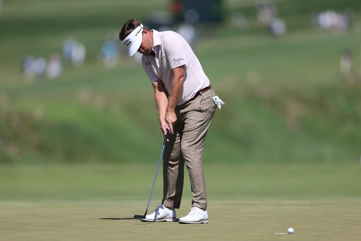 May 10, 2025; Philadelphia, Pennsylvania, USA; Keith Mitchell misses a putt on the fourth hole during the third round of the Truist Championship golf tournament. Mandatory Credit: Bill Streicher-Imagn Images
