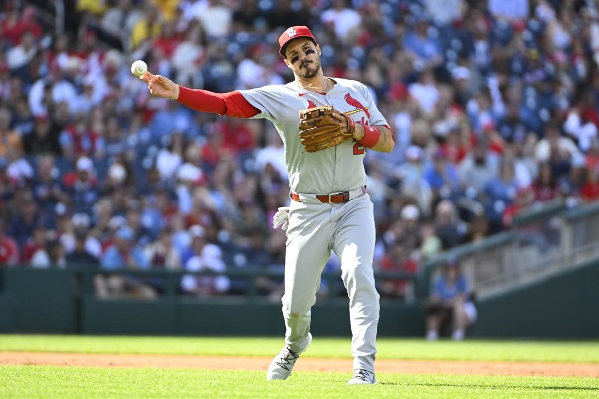 May 10, 2025; Washington, District of Columbia, USA; St. Louis Cardinals third baseman Nolan Arenado (28) throws out Washington Nationals third baseman Jose Tena (not shown) during the second inning at Nationals Park. Mandatory Credit: Brad Mills-Imagn Images