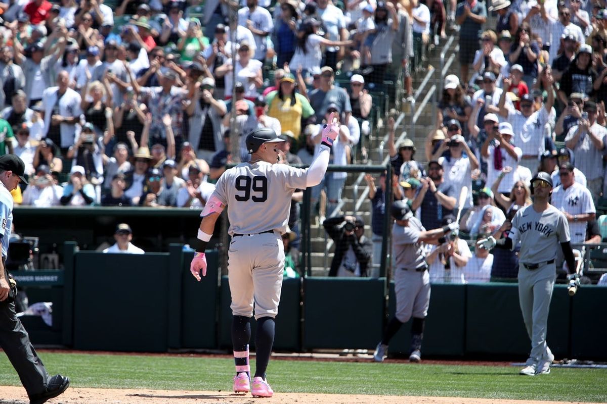 May 10, 2025; West Sacramento, California, USA; New York Yankees designated hitter Aaron Judge (99) reacts to towards the crowd after hitting a solo home run against the Athletics during the fourth inning at Sutter Health Park. Mandatory Credit: Dennis Lee-Imagn Images