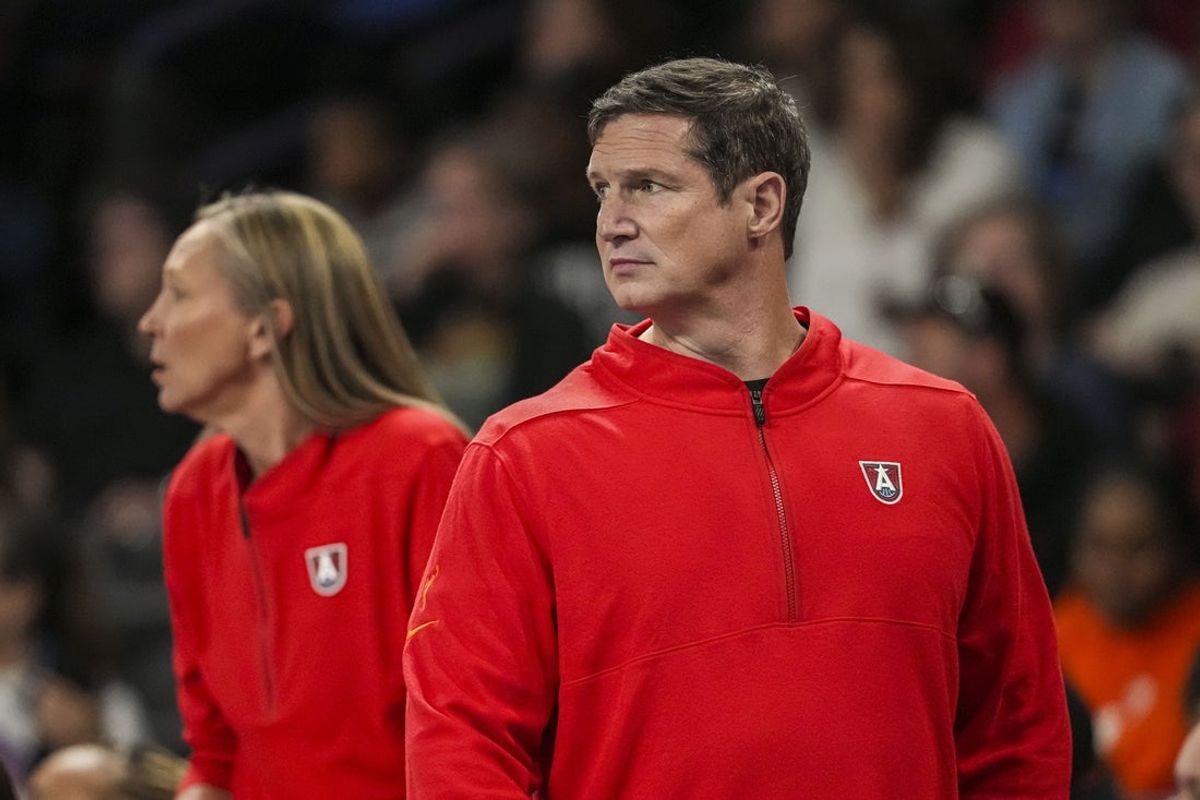 May 10, 2025; Atlanta, GA, USA; Atlanta Dream head coach Karl Smesko on the bench against the Indiana Fever during the first half at Gateway Center Arena @ College Park. Mandatory Credit: Dale Zanine-Imagn Images