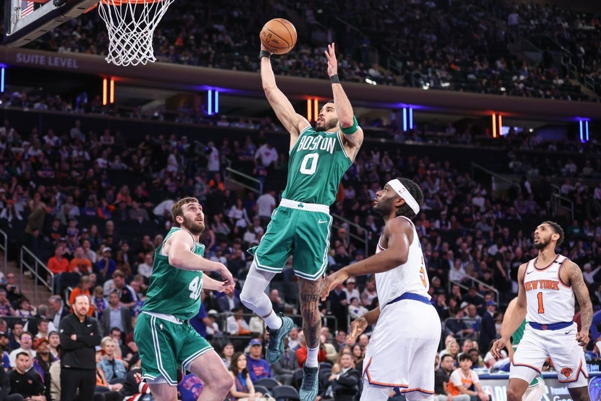 May 10, 2025; New York, New York, USA; Boston Celtics forward Jayson Tatum (0) drives to the basket in the fourth quarter against the New York Knicks during game three of the second round for the 2025 NBA Playoffs at Madison Square Garden. Mandatory Credit: Wendell Cruz-Imagn Images