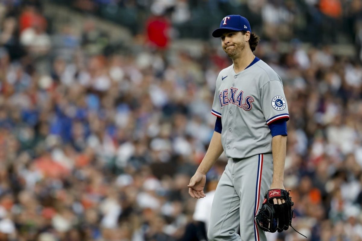 May 10, 2025; Detroit, Michigan, USA;  Texas Rangers starting pitcher Jacob deGrom (48) walks off the field after being relieved in the sixth inning against the Detroit Tigers at Comerica Park. Mandatory Credit: Rick Osentoski-Imagn Images