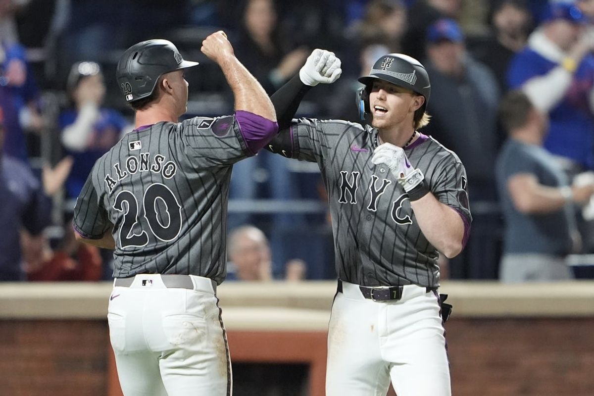 May 10, 2025; New York City, New York, USA; New York Mets first baseman Pete Alonso (20) congratulates New York Mets third baseman Brett Baty (7) for hitting a three run home run against the Chicago Cubs during the fourth inning at Citi Field. Mandatory Credit: Gregory Fisher-Imagn Images