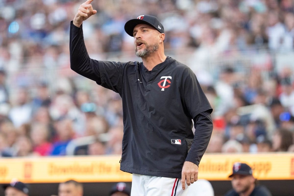 May 10, 2025; Minneapolis, Minnesota, USA; Minnesota Twins manager Rocco Baldelli (5) is ejected after arguing with home plate umpire Adrian Johnson in the sixth inning of the game against the San Francisco Giants at Target Field. Mandatory Credit: Matt Blewett-Imagn Images