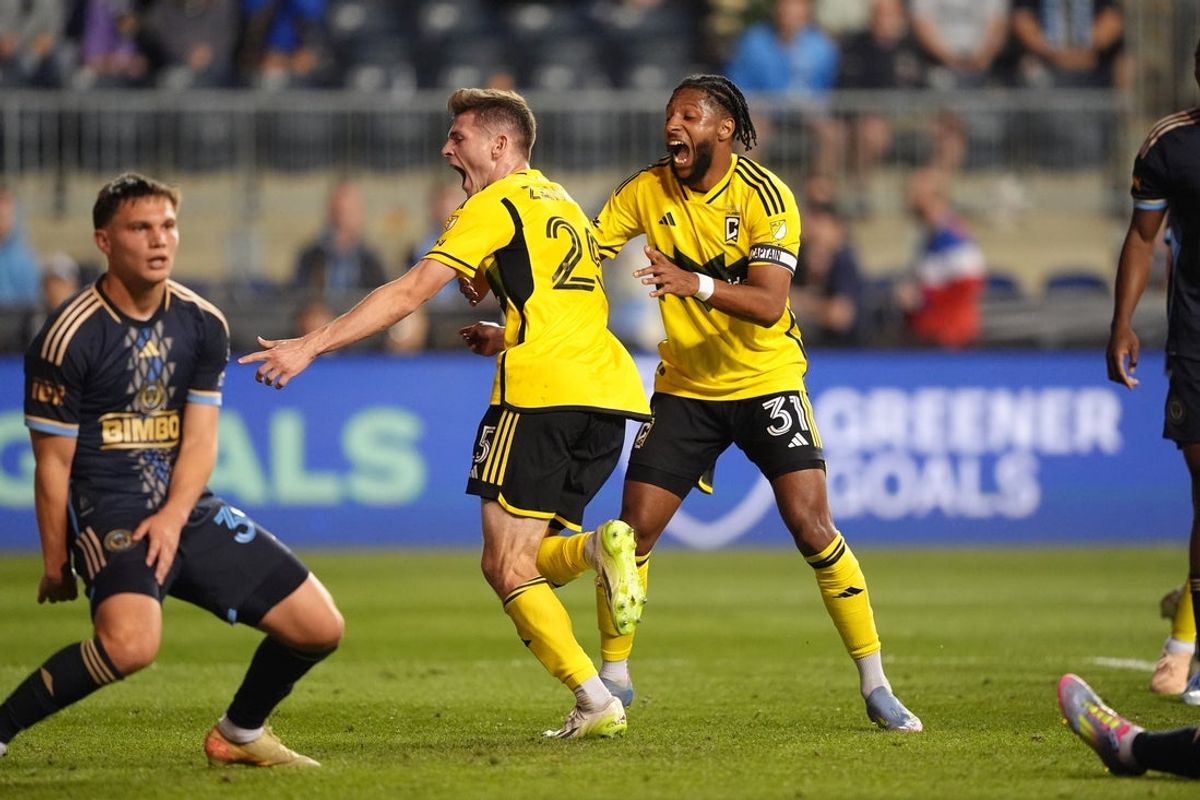 May 10, 2025; Chester, Pennsylvania, USA; Columbus Crew midfielder Sean Zawadzki (25) reacts with defender Steven Moreira (31) after scoring a goal against the Philadelphia Union in the second half at Subaru Park. Mandatory Credit: Kyle Ross-Imagn Images