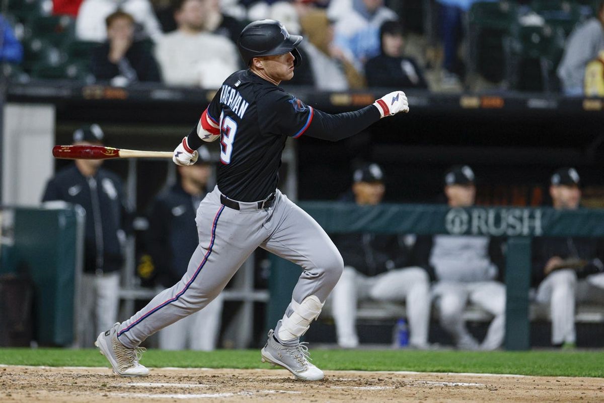 May 10, 2025; Chicago, Illinois, USA; Miami Marlins first baseman Eric Wagaman (33) hits a two-run triple against the Chicago White Sox during the eight inning at Rate Field. Mandatory Credit: Kamil Krzaczynski-Imagn Images
