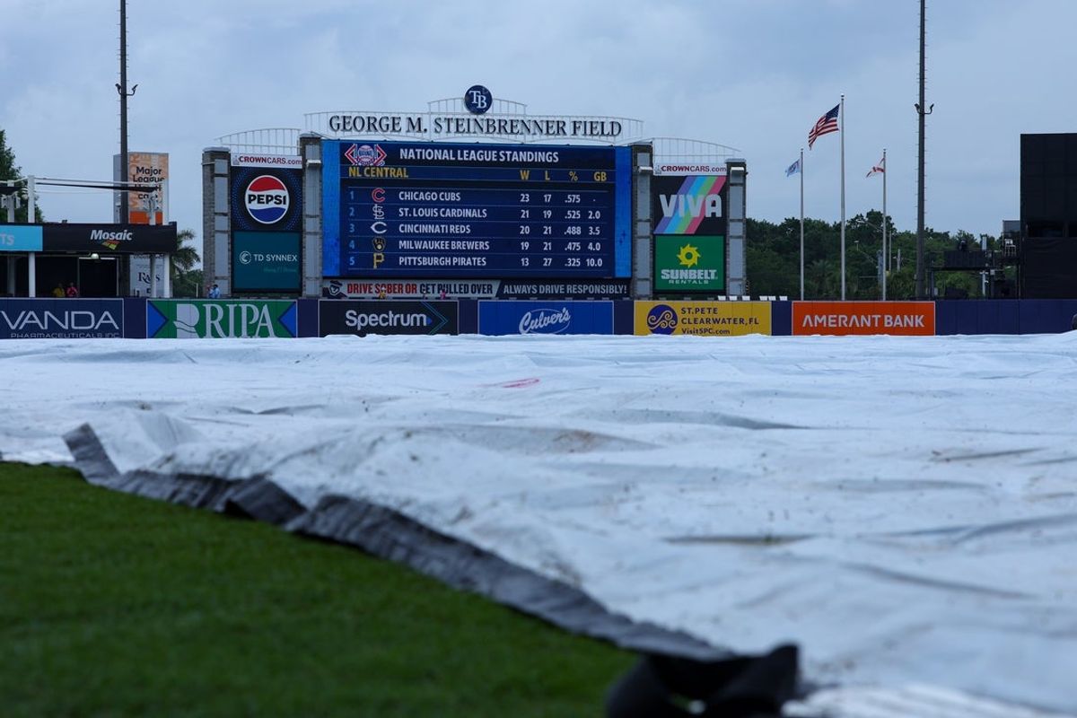 May 11, 2025; Tampa, Florida, USA; a tarp lines the infield  before a game between the Tampa Bay Rays and the Milwaukee Brewers at George M. Steinbrenner Field. Mandatory Credit: Nathan Ray Seebeck-Imagn Images