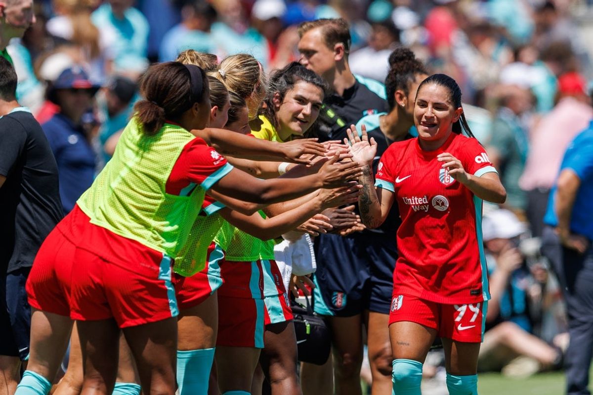 May 11, 2025; Kansas City, Missouri, USA; Kansas City Current midfielder Debinha (99) celebrates after scoring a goal during the first half against the Bay FC at CPKC Stadium. Mandatory Credit: William Purnell-Imagn Images