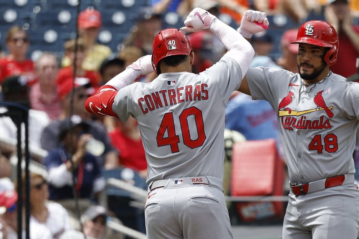 May 11, 2025; Washington, District of Columbia, USA; St. Louis Cardinals first base Willson Contreras (40) celebrates with Cardinals catcher Iván Herrera (48) after hitting a solo home run against the Washington Nationals during the second inning at Nationals Park. Mandatory Credit: Geoff Burke-Imagn Images