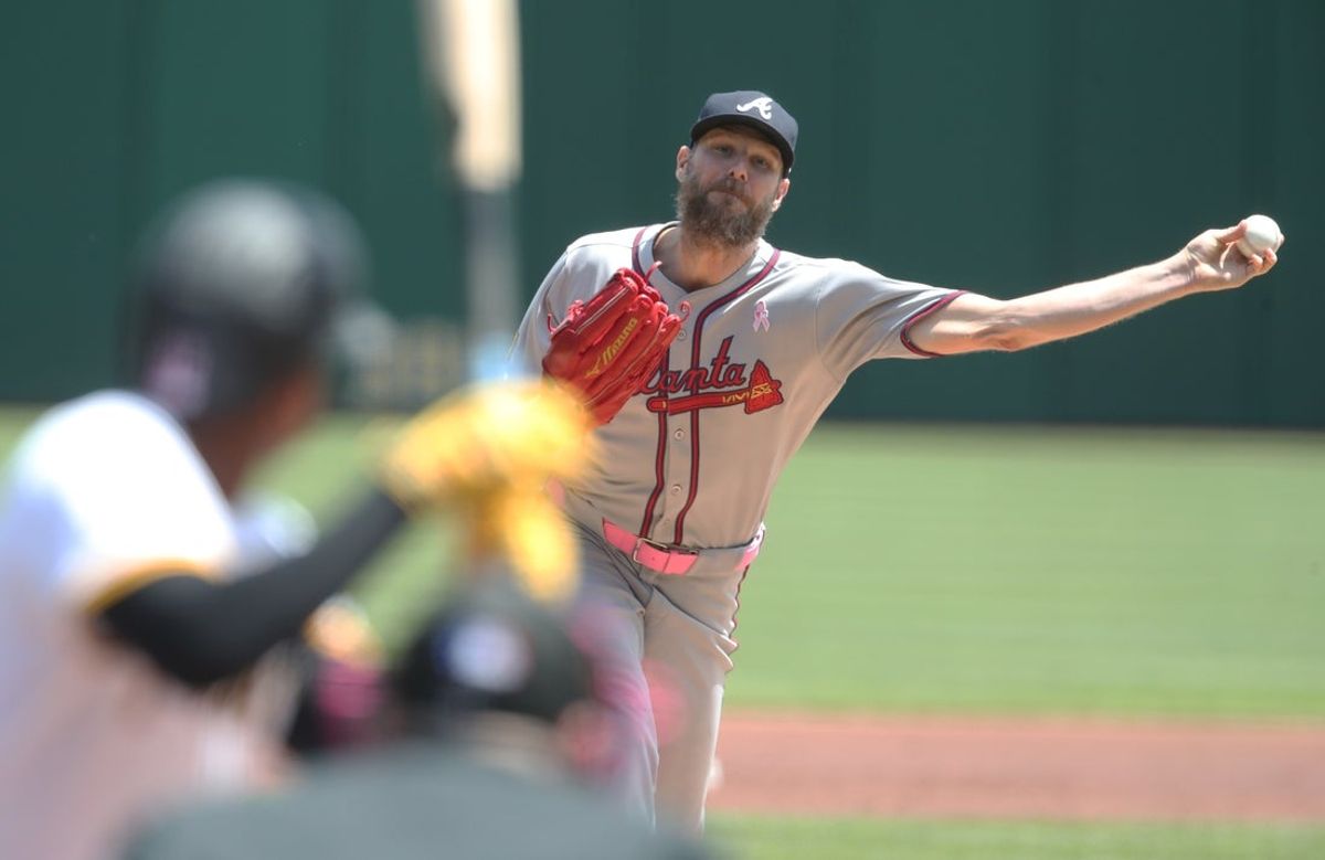 May 11, 2025; Pittsburgh, Pennsylvania, USA;  Atlanta Braves starting pitcher Chris Sale (51) pitches to Pittsburgh Pirates third baseman Ke'Bryan Hayes (13) during the first inning at PNC Park. Mandatory Credit: Charles LeClaire-Imagn Images