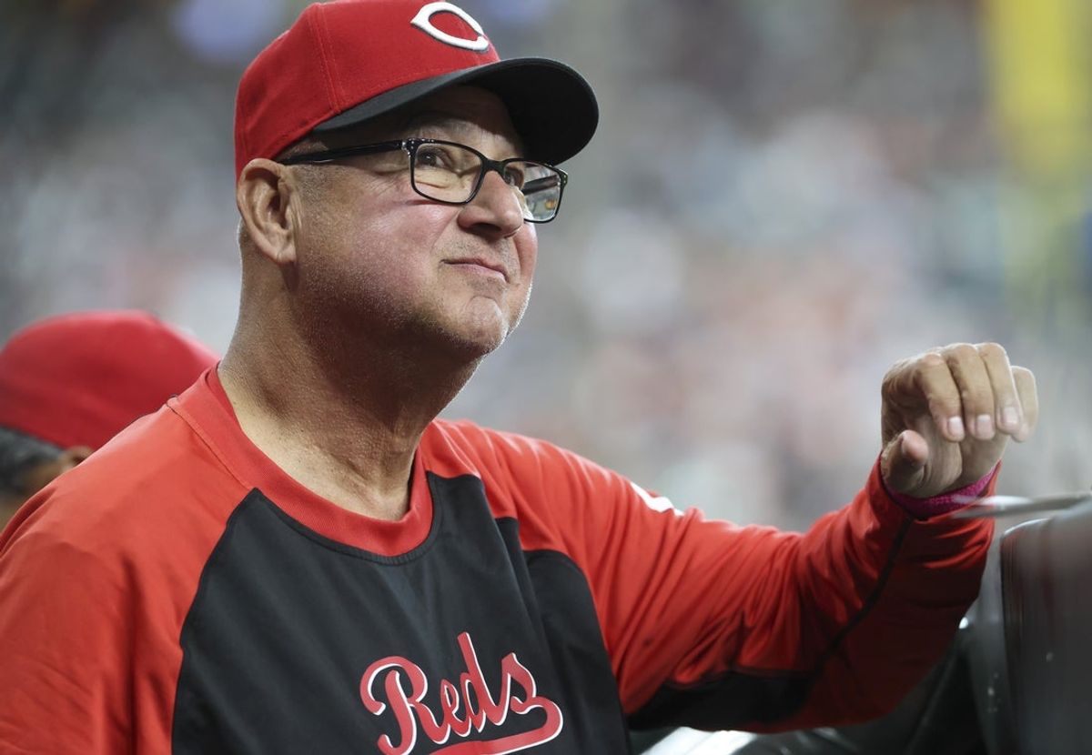 May 11, 2025; Houston, Texas, USA; Cincinnati Reds manager Terry Francona (77) looks on from the dugout during the game against the Houston Astros at Daikin Park. Mandatory Credit: Troy Taormina-Imagn Images
