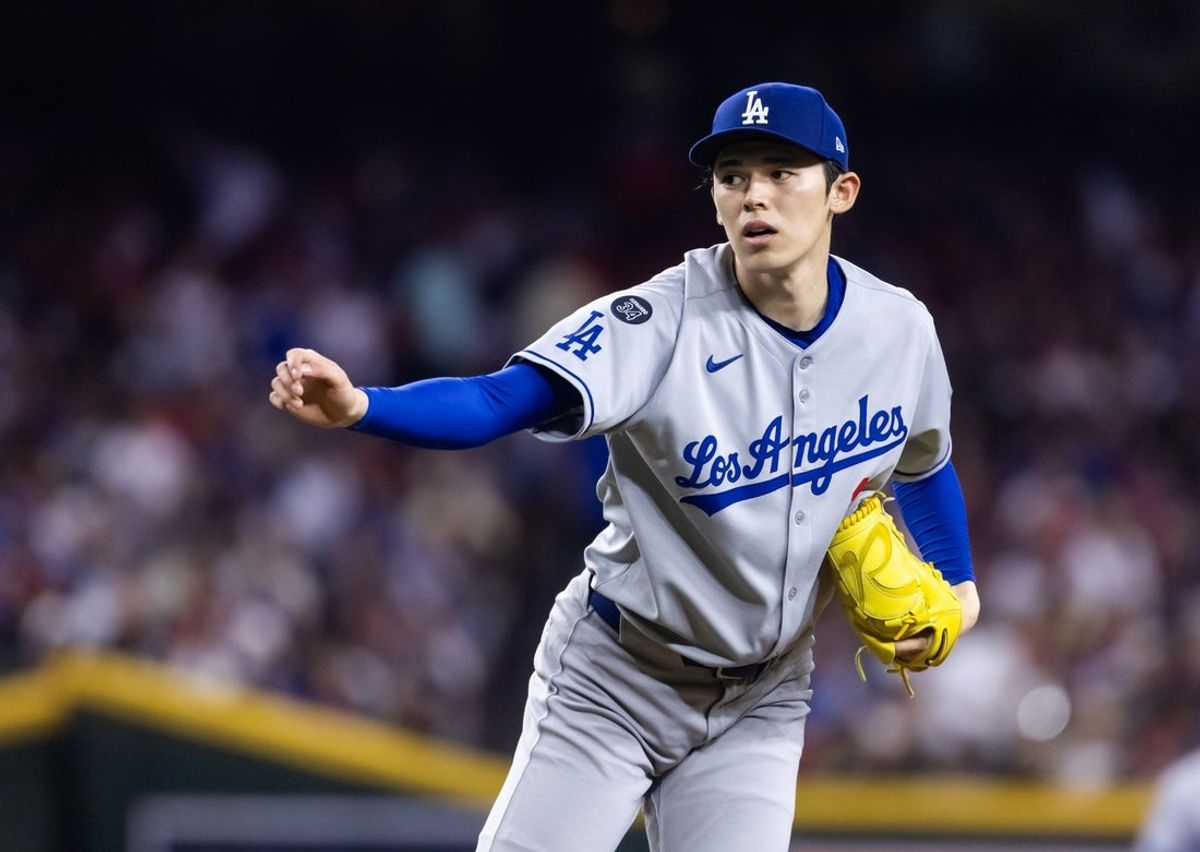 May 9, 2025; Phoenix, Arizona, USA; Los Angeles Dodgers pitcher Roki Sasaki (11) against the Arizona Diamondbacks at Chase Field. Mandatory Credit: Mark J. Rebilas-Imagn Images