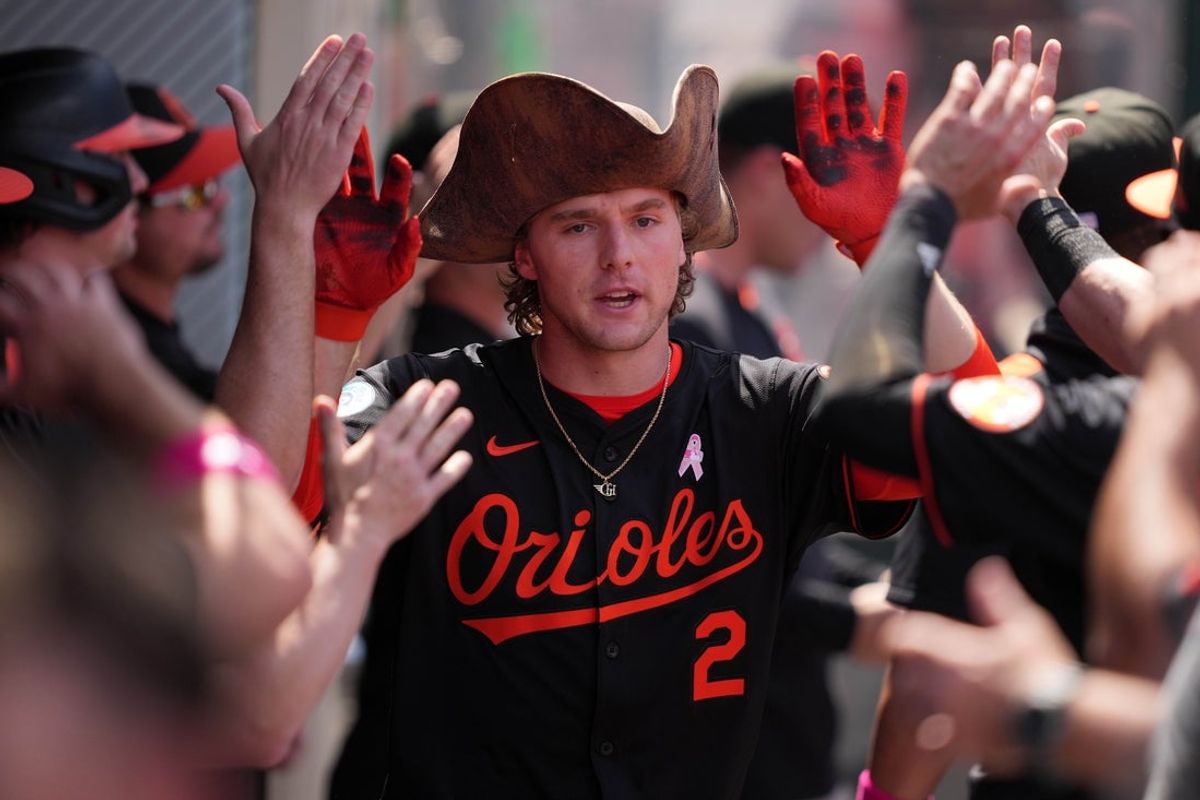 May 11, 2025; Anaheim, California, USA; Baltimore Orioles shortstop Gunnar Henderson (2) is congratulated by teammates after hitting a two-run home run in the sixth inning against the Los Angeles Angels at Angel Stadium. Mandatory Credit: Kirby Lee-Imagn Images