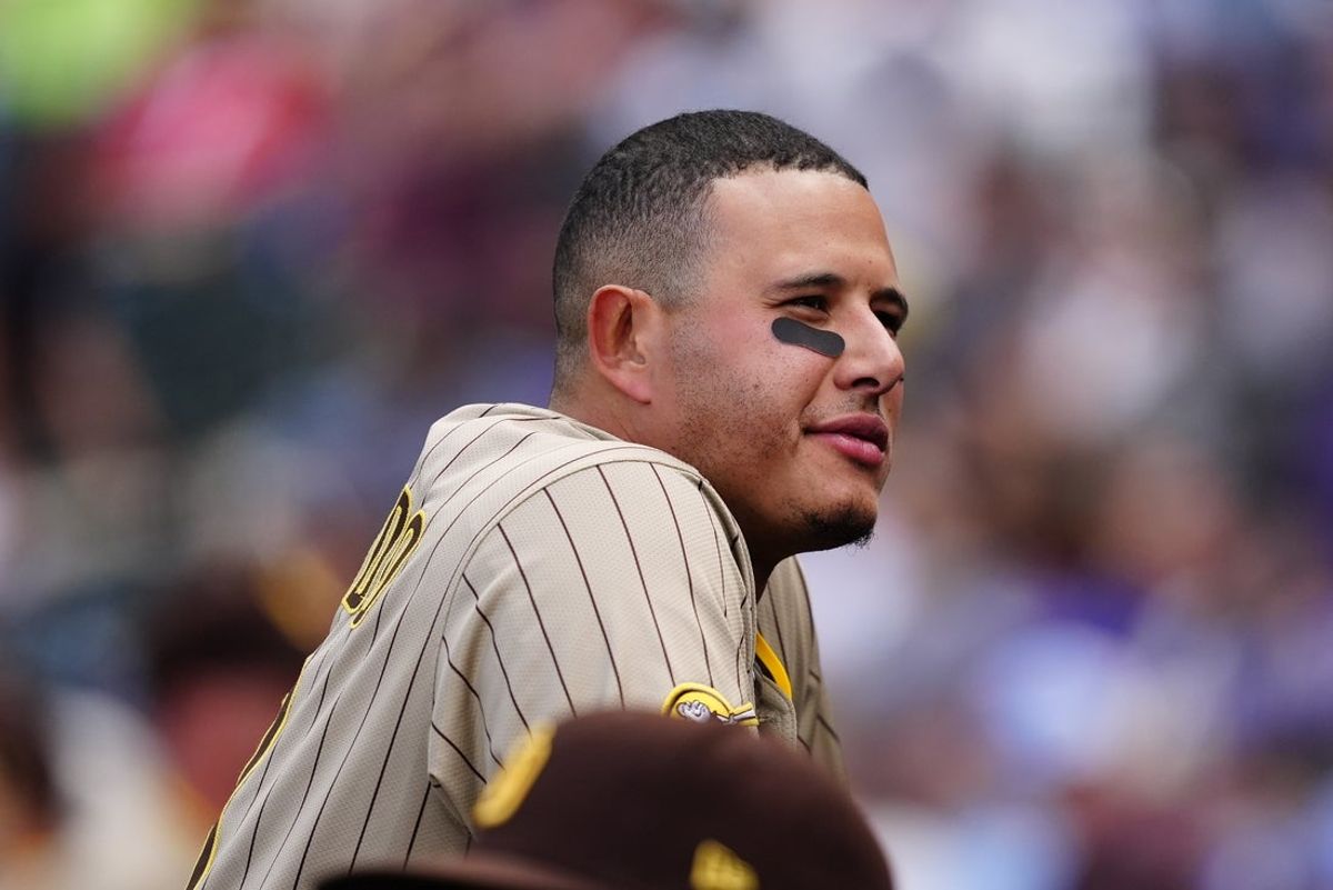 May 11, 2025; Denver, Colorado, USA; San Diego Padres third baseman Manny Machado (13) during the fifth inning against the Colorado Rockies at Coors Field. Mandatory Credit: Ron Chenoy-Imagn Images
