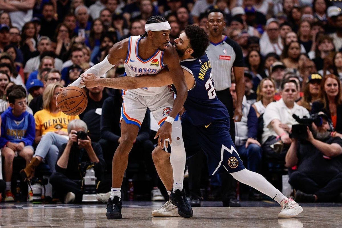 May 11, 2025; Denver, Colorado, USA; Oklahoma City Thunder guard Shai Gilgeous-Alexander (2) controls the ball under pressure from Denver Nuggets guard Jamal Murray (27) in the fourth quarter during game four of the second round of the 2025 NBA Playoffs at Ball Arena. Mandatory Credit: Isaiah J. Downing-Imagn Images