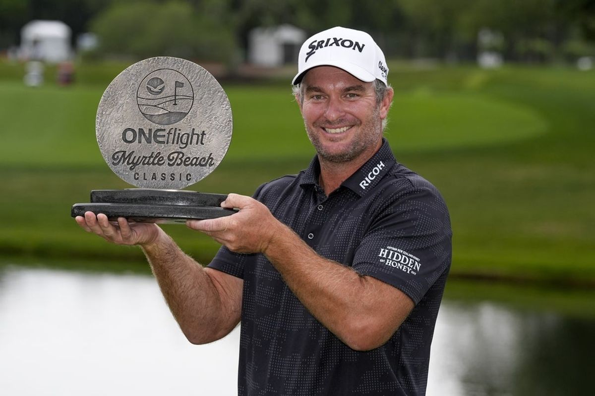 May 11, 2025; Myrtle Beach, South Carolina, USA; Ryan Fox celebrates his playofff win during the final round of the Myrtle Beach Classic golf tournament. Mandatory Credit: Jim Dedmon-Imagn Images