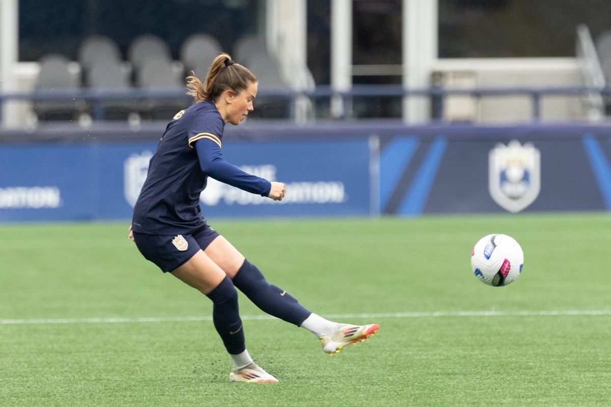 May 11, 2025; Seattle, Washington, USA;  Seattle Reign defender Lauren Barnes (3) kicks the ball across the field  in the second half of the game against the Houston Dash at Lumen Field. Mandatory Credit: Melissa Levin-Imagn Images