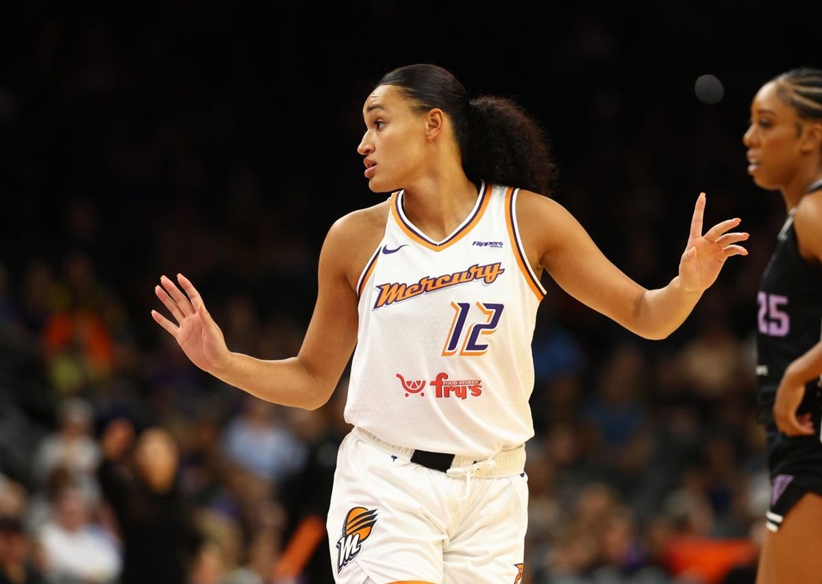 May 11, 2025; Phoenix, AZ, USA; Phoenix Mercury guard Celeste Taylor (12) against the Golden State Valkyries during a preseason game at PHX Arena. Mandatory Credit: Mark J. Rebilas-Imagn Images