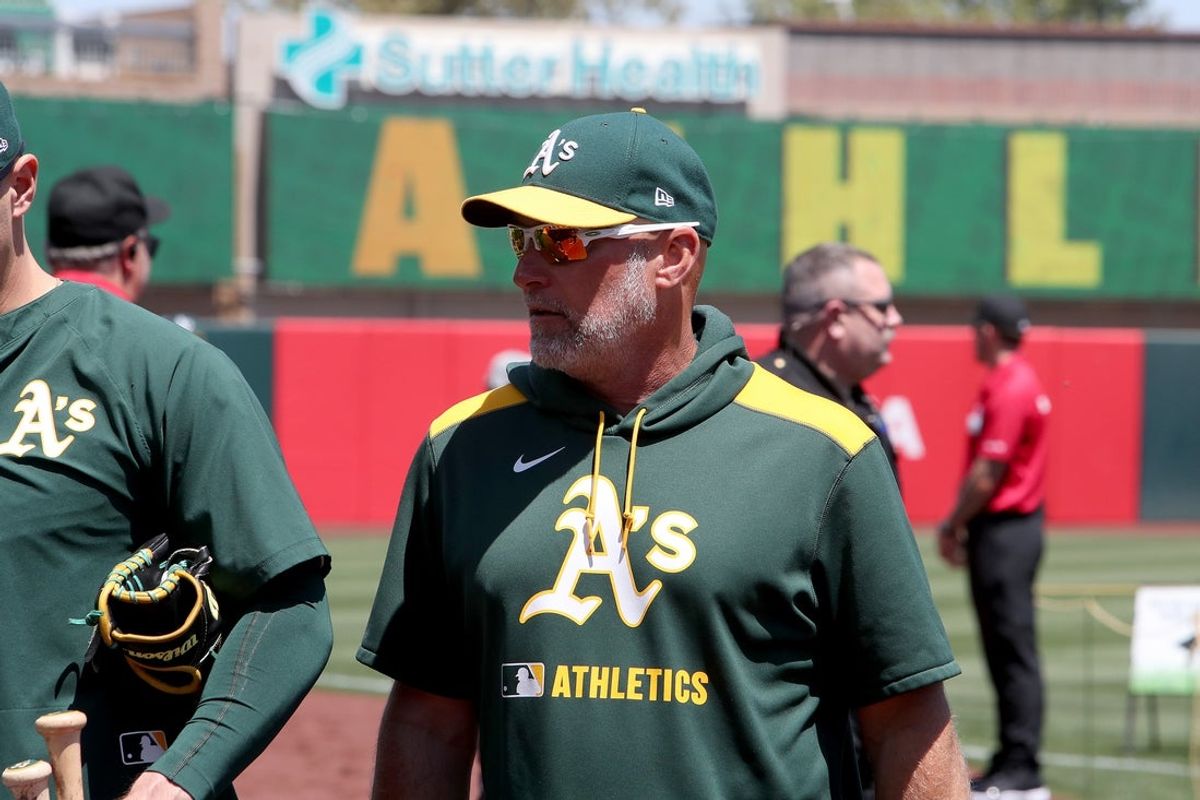 May 10, 2025; West Sacramento, California, USA; Athletics manager Mark Kotsay (7) heads toward the dugout before a game against the New York Yankees at Sutter Health Park. Mandatory Credit: Dennis Lee-Imagn Images