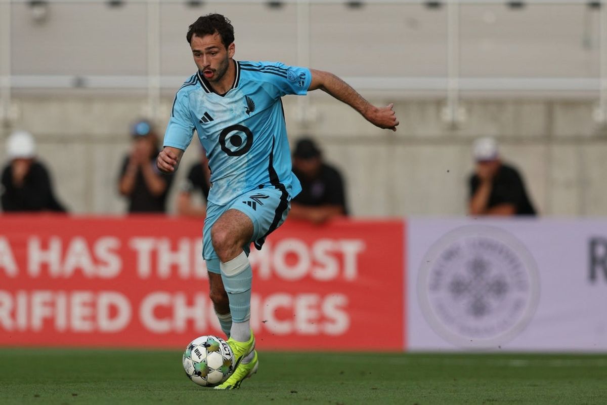 May 7, 2025; Louisville, Kentucky, USA;  Minnesota United FC defender Devin Padelford (2) juggles the ball during the first half against Louisville City FC at Lynn Family Stadium. Mandatory Credit: EM Dash-Imagn Images