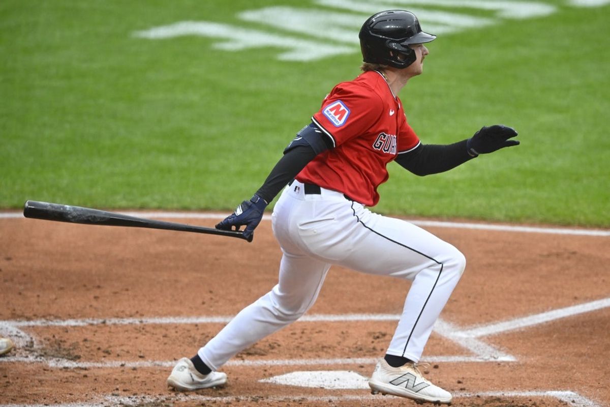 May 12, 2025; Cleveland, Ohio, USA; Cleveland Guardians designated hitter Kyle Manzardo (9) singles in the second inning against the Milwaukee Brewers at Progressive Field. Mandatory Credit: David Richard-Imagn Images