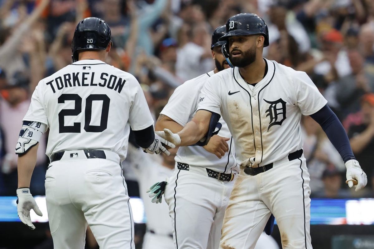 May 12, 2025; Detroit, Michigan, USA;  Detroit Tigers outfielder Riley Greene (31) receives congratulations from first base Spencer Torkelson (20) after he hits a three rum hits an RBI single third inning against the Boston Red Sox at Comerica Park. Mandatory Credit: Rick Osentoski-Imagn Images