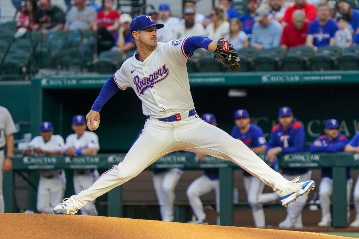 May 12, 2025; Arlington, Texas, USA; Texas Rangers pitcher Tyler Mahle (51) throws to the plate during the first inning against the Colorado Rockies at Globe Life Field. Mandatory Credit: Raymond Carlin III-Imagn Images