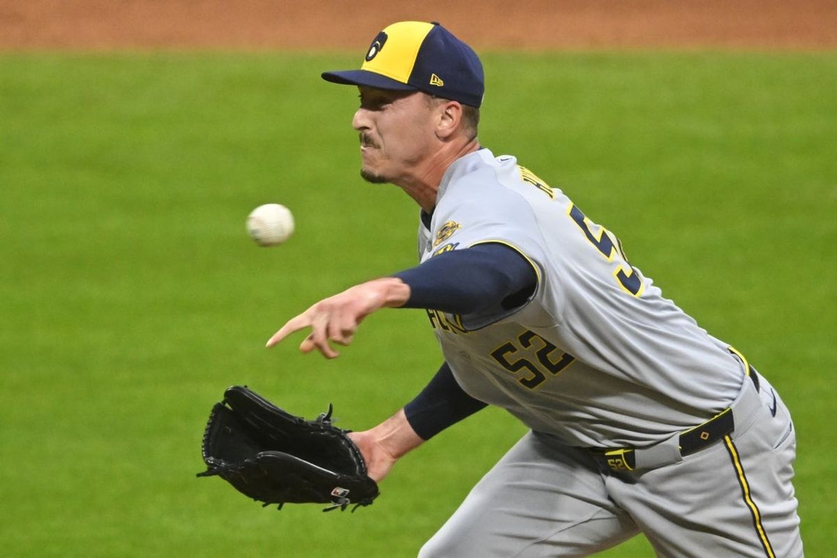 May 12, 2025; Cleveland, Ohio, USA; Milwaukee Brewers relief pitcher Bryan Hudson (52) delivers a pitch in the sixth inning against the Cleveland Guardians at Progressive Field. Mandatory Credit: David Richard-Imagn Images