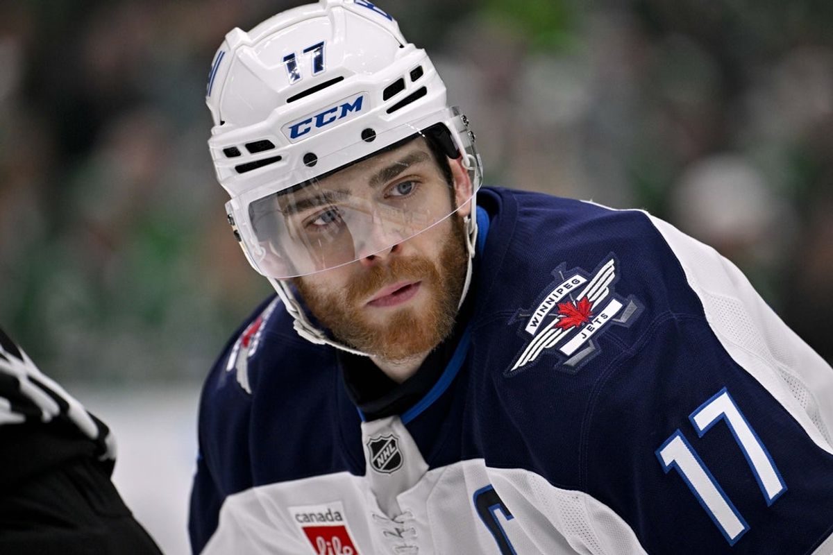 May 11, 2025; Dallas, Texas, USA; Winnipeg Jets center Adam Lowry (17) in action during the game between the Dallas Stars and the Winnipeg Jets in game three of the second round of the 2025 Stanley Cup Playoffs at American Airlines Center. Mandatory Credit: Jerome Miron-Imagn Images