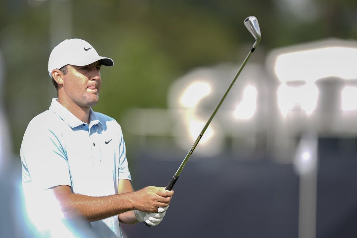 May 13, 2025; Charlotte, North Carolina, USA; Scottie Scheffler looks down his club on a practice day for the PGA Championship golf tournament at Quail Hollow. Mandatory Credit: Jim Dedmon-Imagn Images