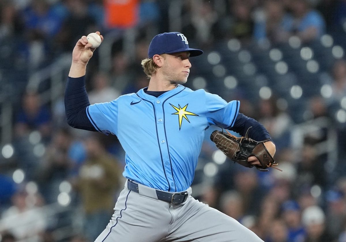 May 13, 2025; Toronto, Ontario, CAN; Tampa Bay Rays starting pitcher Shane Baz (11) throws a pitch against the Toronto Blue Jays during the first inning at Rogers Centre. Mandatory Credit: Nick Turchiaro-Imagn Images