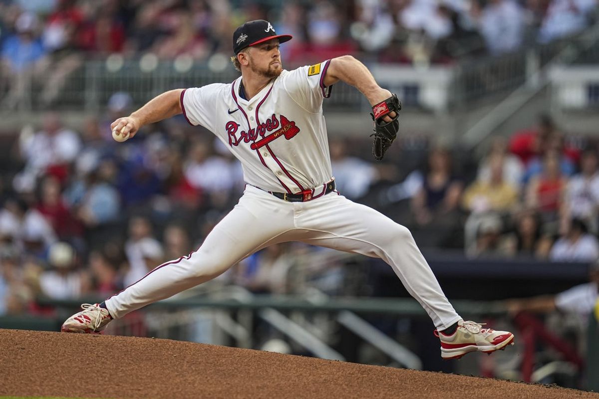 May 13, 2025; Cumberland, Georgia, USA; Atlanta Braves starting pitcher Spencer Schwellenbach (56) pitches against the Washington Nationals during the second inning at Truist Park. Mandatory Credit: Dale Zanine-Imagn Images