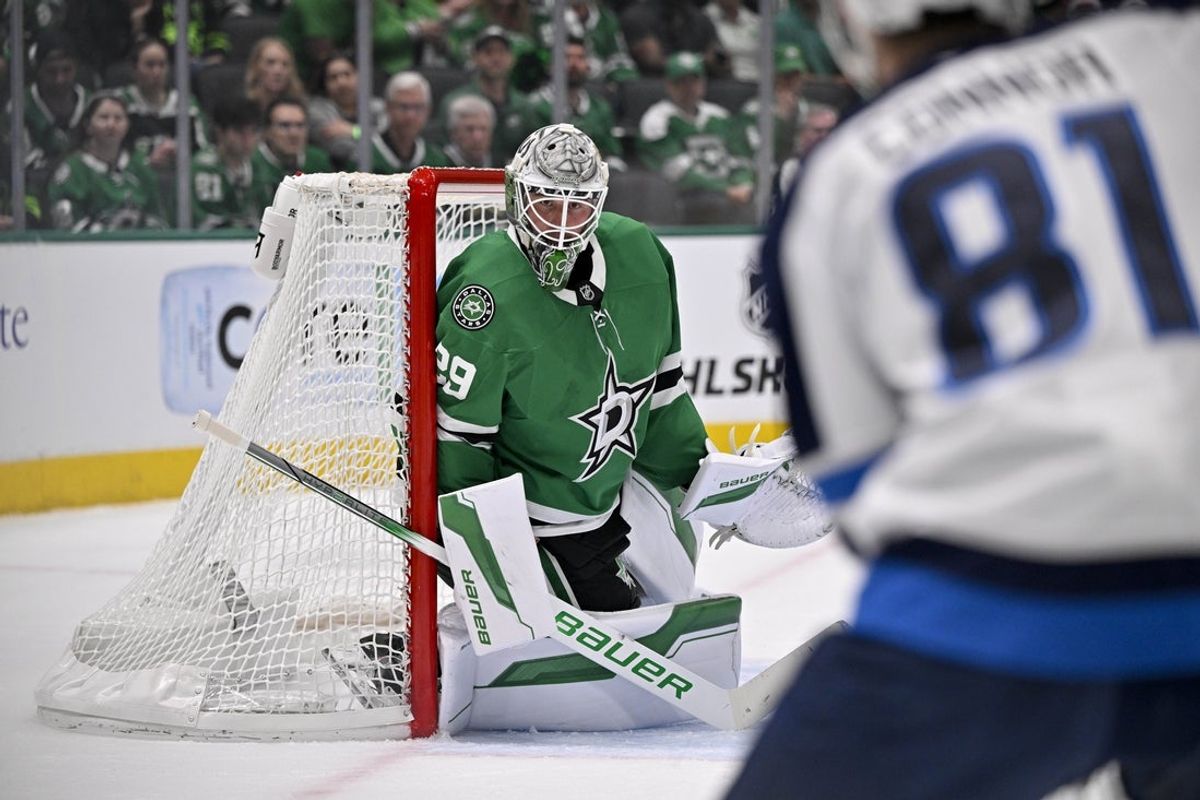 May 13, 2025; Dallas, Texas, USA; Dallas Stars goaltender Jake Oettinger (29) faces a shot from Winnipeg Jets left wing Kyle Connor (81) during the first period in game four of the second round of the 2025 Stanley Cup Playoffs at American Airlines Center. Mandatory Credit: Jerome Miron-Imagn Images