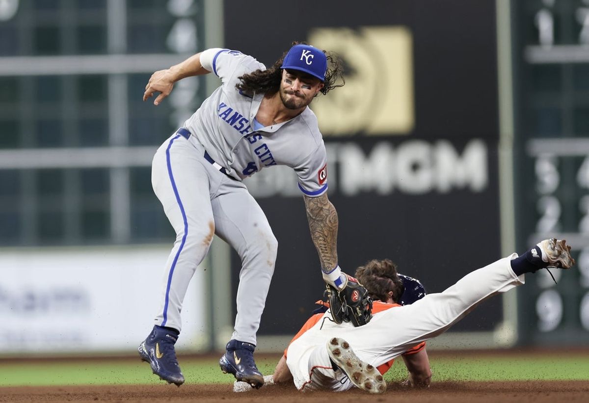 May 13, 2025; Houston, Texas, USA; Houston Astros center fielder Jake Meyers (6) is tagged out by Kansas City Royals second baseman Jonathan India (6) while trying to steal second base in the fourth inning at Daikin Park. Mandatory Credit: Thomas Shea-Imagn Images