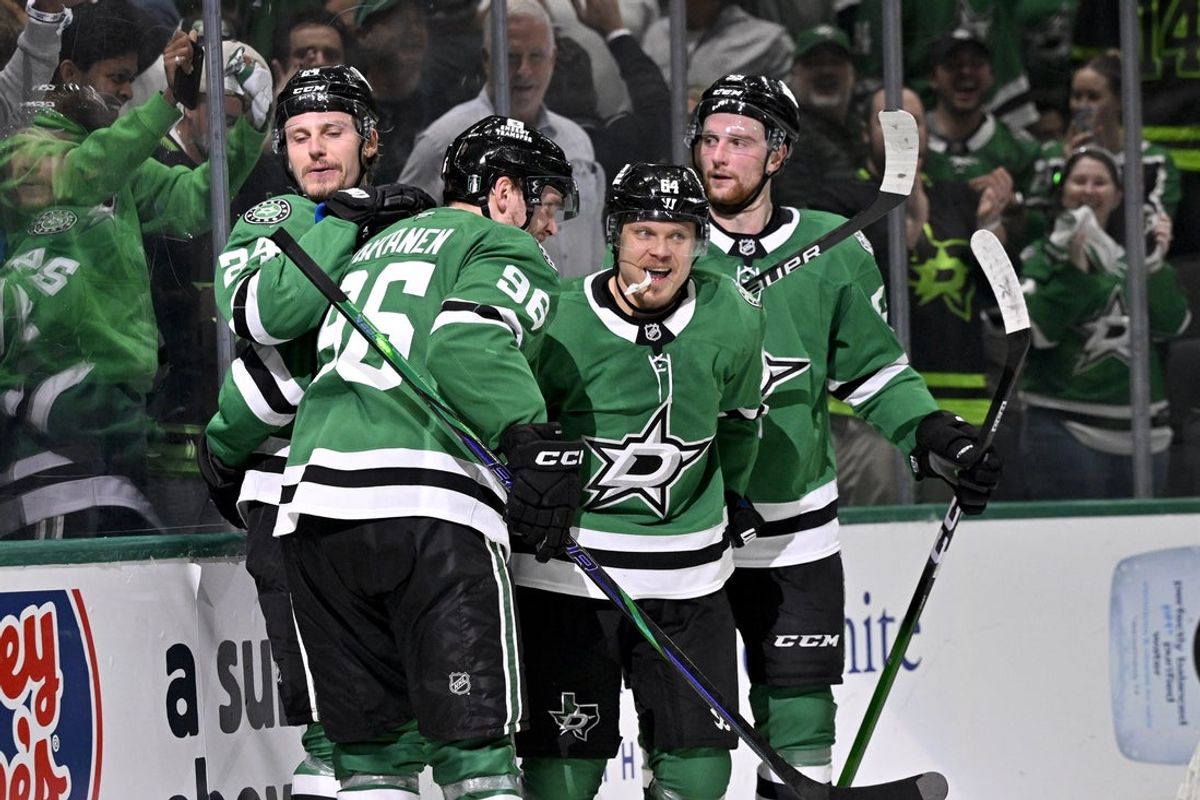 May 13, 2025; Dallas, Texas, USA; Dallas Stars right wing Mikko Rantanen (96) and center Roope Hintz (24) and center Mikael Granlund (64) and defenseman Thomas Harley (55) celebrates a goal scored by Granlund against the Winnipeg Jets during the second period in game four of the second round of the 2025 Stanley Cup Playoffs at American Airlines Center. Mandatory Credit: Jerome Miron-Imagn Images