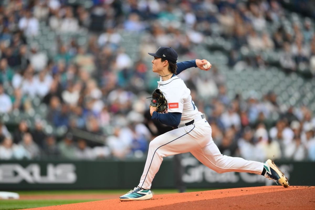 May 13, 2025; Seattle, Washington, USA; Seattle Mariners starting pitcher Bryan Woo (22) pitches to the New York Yankees during the first inning at T-Mobile Park. Mandatory Credit: Steven Bisig-Imagn Images