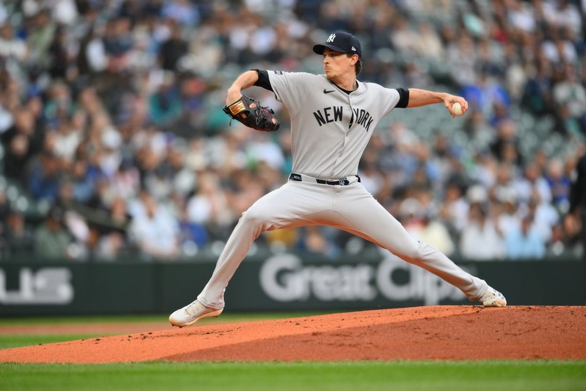 May 13, 2025; Seattle, Washington, USA; New York Yankees starting pitcher Max Fried (54) pitches to the Seattle Mariners during the first inning at T-Mobile Park. Mandatory Credit: Steven Bisig-Imagn Images