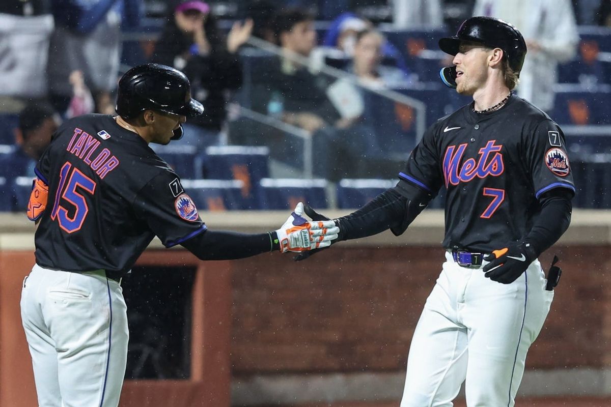 May 13, 2025; New York City, New York, USA; New York Mets second baseman Brett Baty (7) is greeted by center fielder Tyrone Taylor (15) after hitting a solo home run in the seventh inning against the Pittsburgh Pirates at Citi Field. Mandatory Credit: Wendell Cruz-Imagn Images