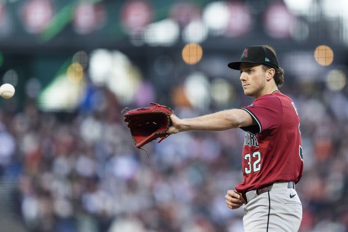 May 13, 2025; San Francisco, California, USA; Arizona Diamondbacks starting pitcher Brandon Pfaadt (32) prepares to throw against the San Francisco Giants during the first inning at Oracle Park. Mandatory Credit: John Hefti-Imagn Images